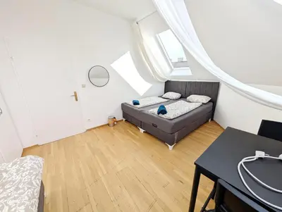 Ein Bett oder Betten in einem Zimmer der Unterkunft Lovely Rooms in Märzstraße Area MZ49