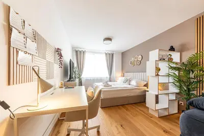 Ein Bett oder Betten in einem Zimmer der Unterkunft Boho Vienna by JR City Apartments - Main station, Belvedere, City Center