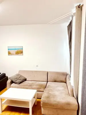 Ein Sitzbereich in der Unterkunft Lovely Rooms in Märzstraße Area MZ10