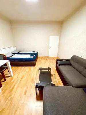 Ein Sitzbereich in der Unterkunft Lovely Rooms in Märzstraße Area MZ10