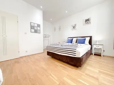 Ein Bett oder Betten in einem Zimmer der Unterkunft 3 Bedrooms, near Hauptbahnhof, 8 People, Kitchen