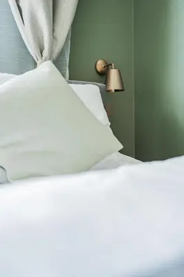 Ein Bett oder Betten in einem Zimmer der Unterkunft HOME1 - Jardin Boutique Hostel