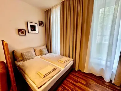 Ein Bett oder Betten in einem Zimmer der Unterkunft TheWICKI 2250 - Wunderschöne Apartments in Wien