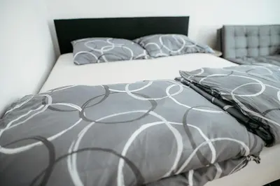 Ein Bett oder Betten in einem Zimmer der Unterkunft Stylisches City -Apartment