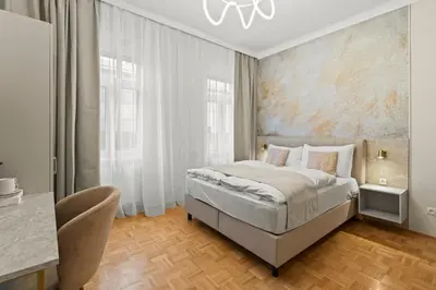 Ein Bett oder Betten in einem Zimmer der Unterkunft Meidling Rooms I 1 Min to U6 I Self Check In