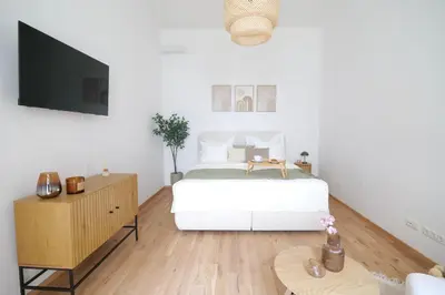 Ein Bett oder Betten in einem Zimmer der Unterkunft Toplage beim Rathaus Grace Royal Designsuite