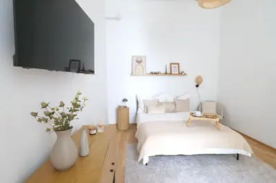 Ein Bett oder Betten in einem Zimmer der Unterkunft Toplage beim Rathaus Grace Cosy Designsuite