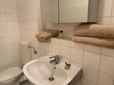 Ein Badezimmer in der Unterkunft Modern City Apartment for 2 I Free Parking