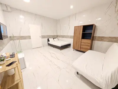 Ein Bett oder Betten in einem Zimmer der Unterkunft Elegant Vienna Apartments in Prime Location Steps from Danube & Prater