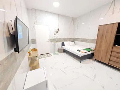TV/Unterhaltungsangebot in der Unterkunft Elegant Vienna Apartments in Prime Location Steps from Danube & Prater