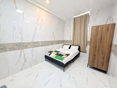 Ein Bett oder Betten in einem Zimmer der Unterkunft Elegant Vienna Apartments in Prime Location Steps from Danube & Prater