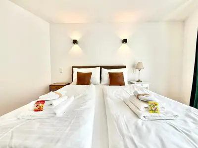 Ein Bett oder Betten in einem Zimmer der Unterkunft Möblierte Wohnung