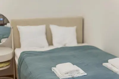 Ein Bett oder Betten in einem Zimmer der Unterkunft Downtown Apartment