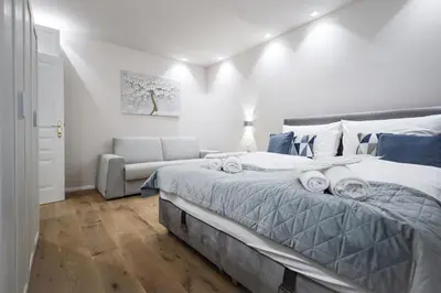 Ein Bett oder Betten in einem Zimmer der Unterkunft BRAND NEW! Apartment Gold - right near Schönbrunn Palace