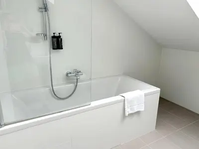 Ein Badezimmer in der Unterkunft City Apartment Haberl