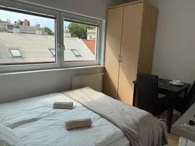 Ein Bett oder Betten in einem Zimmer der Unterkunft Urban Studio for 2 I Free Parking