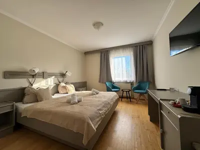 Ein Bett oder Betten in einem Zimmer der Unterkunft Gasthaus Paus