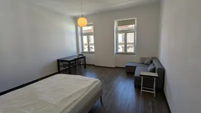 Ein Bett oder Betten in einem Zimmer der Unterkunft Cozy Apt near Schönbrunn