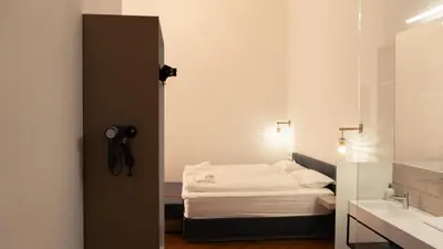 Ein Bett oder Betten in einem Zimmer der Unterkunft Elias Residence Vienna