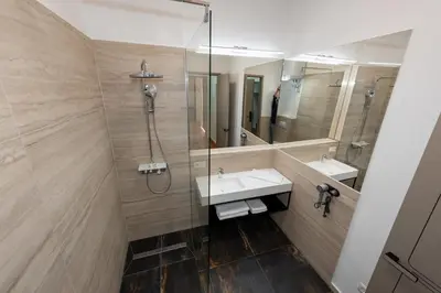 Ein Badezimmer in der Unterkunft Elias Residence Vienna