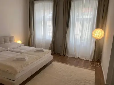Ein Bett oder Betten in einem Zimmer der Unterkunft Habicher Vienna Apartments