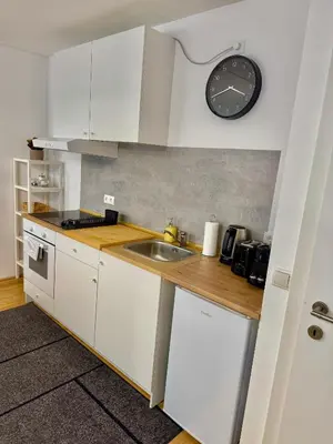 Küche/Küchenzeile in der Unterkunft Luxury Apartment with Patio - Free Parking
