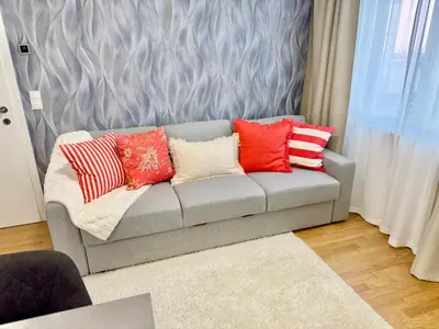 Ein Sitzbereich in der Unterkunft Luxury Apartment with Patio - Free Parking