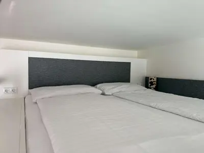 Ein Bett oder Betten in einem Zimmer der Unterkunft Central and stylish studio in Vienna