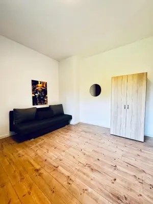 Ein Sitzbereich in der Unterkunft Central 8BR Apt, with Garden & Tarrace, Sleeps 17