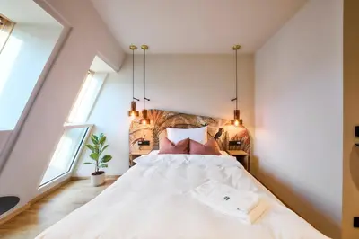 Ein Bett oder Betten in einem Zimmer der Unterkunft Hotel Karol