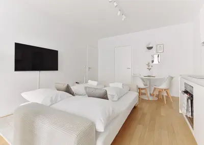 Ein Bett oder Betten in einem Zimmer der Unterkunft Luxury 2 Bedroom Apartment with Garden