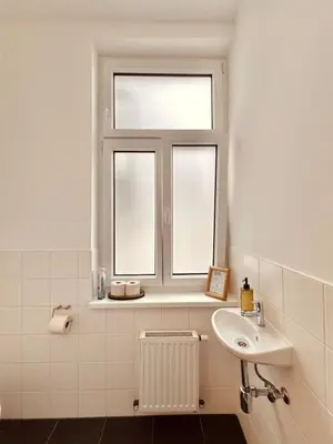Ein Badezimmer in der Unterkunft SERVUS HOMES - Metro Stadthalle - SOUND OF MUSIC