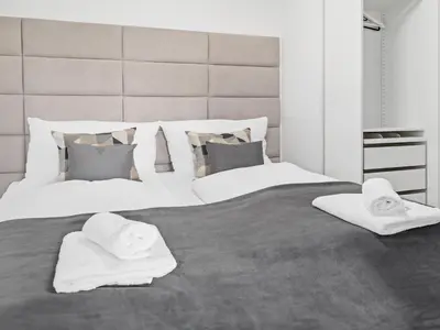Ein Bett oder Betten in einem Zimmer der Unterkunft Modern City Apartment near Vienna Central Station
