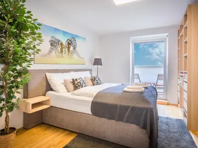 Ein Bett oder Betten in einem Zimmer der Unterkunft Modern City Apartment near Vienna Central Station