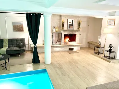 Ein Sitzbereich in der Unterkunft UNO POOL Apartment