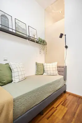 Ein Bett oder Betten in einem Zimmer der Unterkunft Design Apartment Vienna by JR City Apartments
