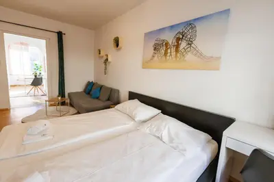 Ein Bett oder Betten in einem Zimmer der Unterkunft Vienna-Style Cozy Apartments