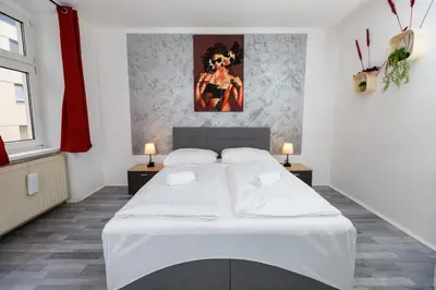Ein Bett oder Betten in einem Zimmer der Unterkunft Vienna-Style Cozy Apartments
