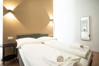 Ein Bett oder Betten in einem Zimmer der Unterkunft Modern 1-bedroom apartment next to Praterstern
