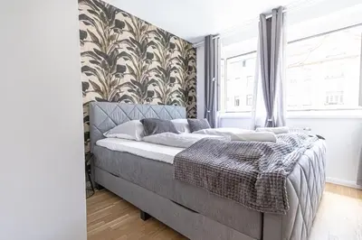 Ein Bett oder Betten in einem Zimmer der Unterkunft Stylish 1BR with Living Room 9 Min to Downtown Metro Nearby
