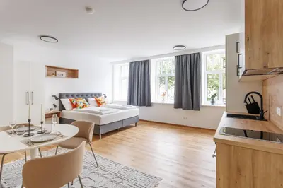 Ein Bett oder Betten in einem Zimmer der Unterkunft New City Studio near Schönbrunn Palace & Metro U3