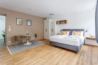 Ein Bett oder Betten in einem Zimmer der Unterkunft New City Studio near Schönbrunn Palace & Metro U3