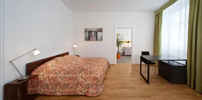 Ein Bett oder Betten in einem Zimmer der Unterkunft Schlossquadrat Apartment 17