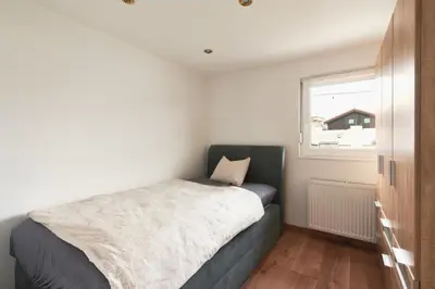 Ein Bett oder Betten in einem Zimmer der Unterkunft Elegant 3BD Holiday Home in Prime Location of Vienna
