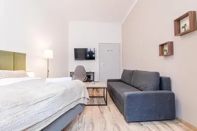 Ein Bett oder Betten in einem Zimmer der Unterkunft Stylish 1BR Apartment Near Schönbrunn & Westbahnhof Ideal for Longstays