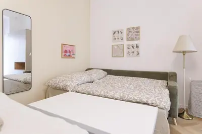 Ein Bett oder Betten in einem Zimmer der Unterkunft Renovated Central Apartment with Terrace