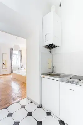 Küche/Küchenzeile in der Unterkunft Central Cosy Stylish Apartment