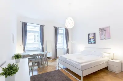 Ein Bett oder Betten in einem Zimmer der Unterkunft Central Cosy Stylish Apartment