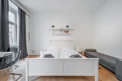 Ein Bett oder Betten in einem Zimmer der Unterkunft Central Cosy Stylish Apartment
