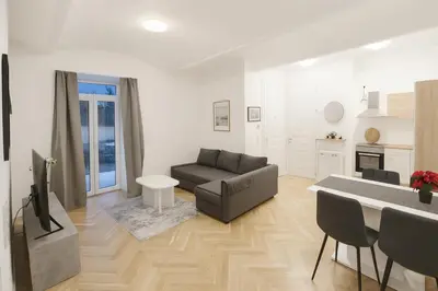 Ein Sitzbereich in der Unterkunft Céleste Suites